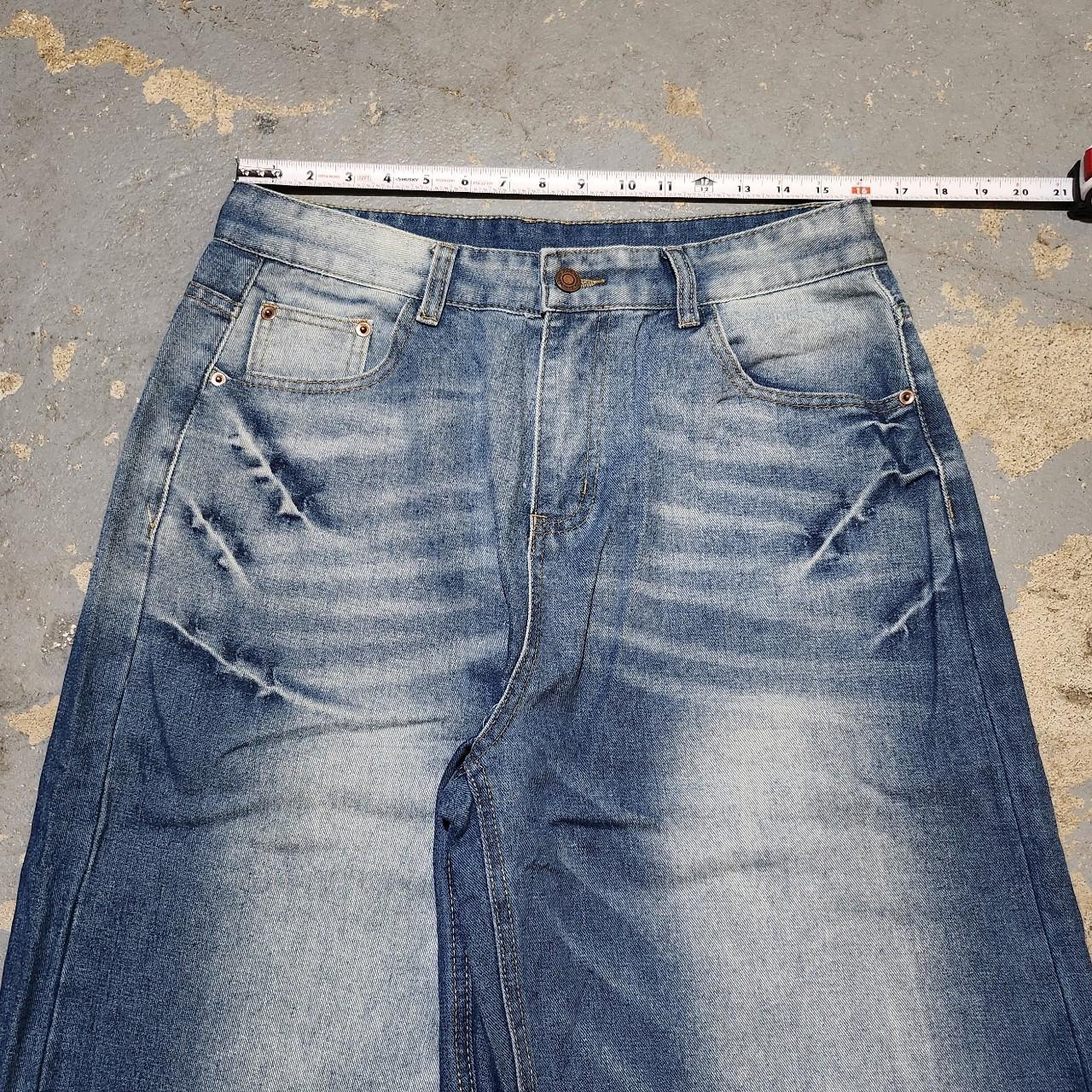 Faded blue baggy jeans wide leg denim